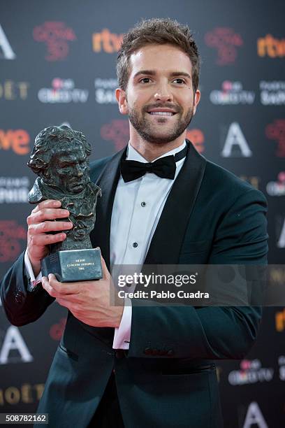 Pablo Alboran holds the award for best original song during the 30th edition of the Goya Cinema Awards at Madrid Marriott Auditorium on February 6,...