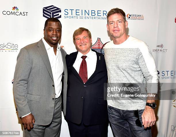 Retired professional football player Kordell Stewart, sports agent Leigh Steinberg, and retired professional football player Troy Aikman attend the...