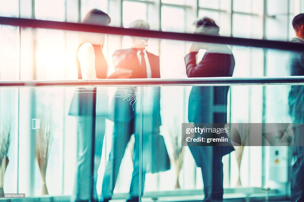 Group of business people in the office building lobby