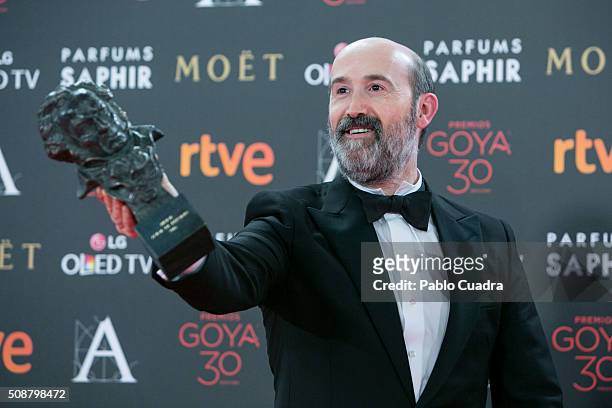 Javier Camara holds the award for Best Actor In Supporting Role award during the 30th edition of the Goya Cinema Awards at Madrid Marriott Auditorium...