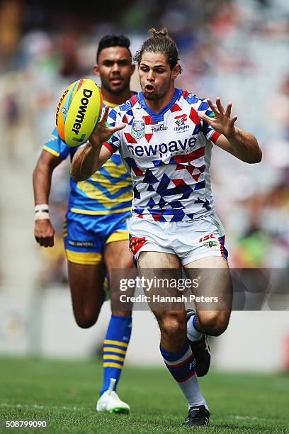 Jake Mamo of the Newcastle Knights chases the ball down during the 2016 Auckland Nines quarter final match between the Parramatta Eels and the...