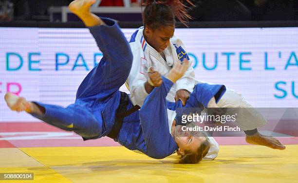 Priscilla Gneto of France throws Maria Ertel of Germany for a yuko to win their match on her way to the u52kg bronze medal during the 2016 Paris Judo...