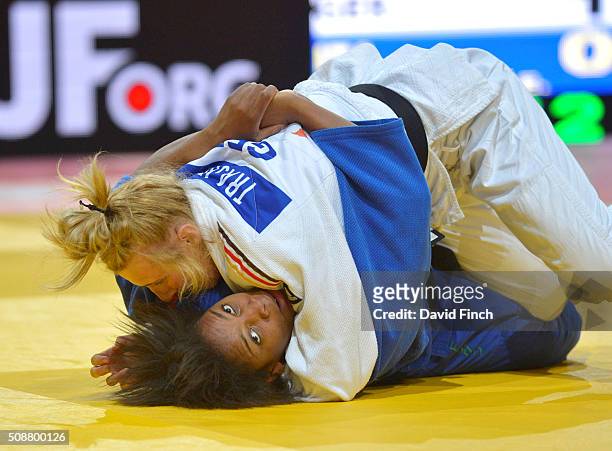 European champion, Martyna Trajdos of Germany attempts to hold Edwige Gwend of Italy eventually winning their u63kg contest by a yuko on her way to...