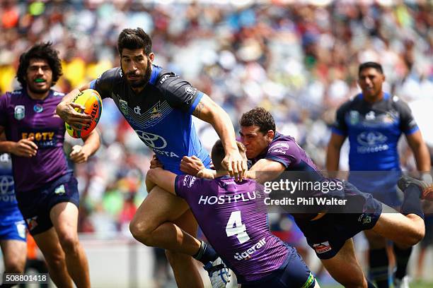 James Tamou of the Cowboys is tackled during the 2016 Auckland Nines quarterfinal match between the Storm and the Cowboys at Eden Park on February 7,...