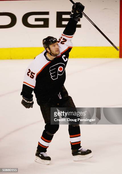 Keith Primeau of the Philadelphia Flyers celebrates after scoring the game tying goal in the third period against the Tampa Bay Lightning in Game six...