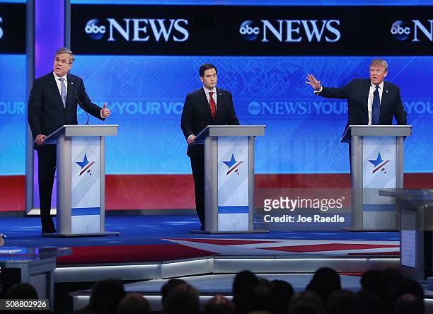 Republican presidential candidates Jeb Bush, Sen. Marco Rubio and Donald Trump participate in the Republican presidential debate at St. Anselm...