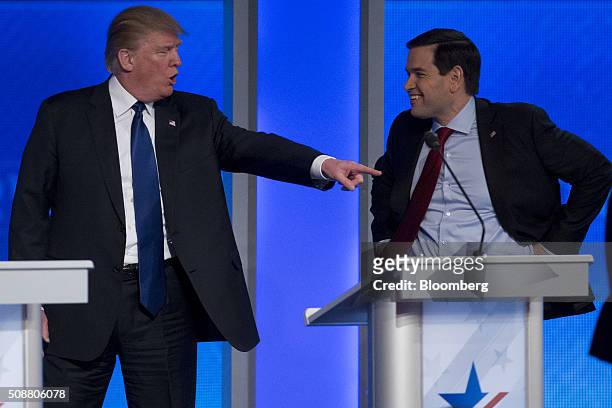 Donald Trump, president and chief executive of Trump Organization Inc. And 2016 Republican presidential candidate, left, talks to Senator Marco...