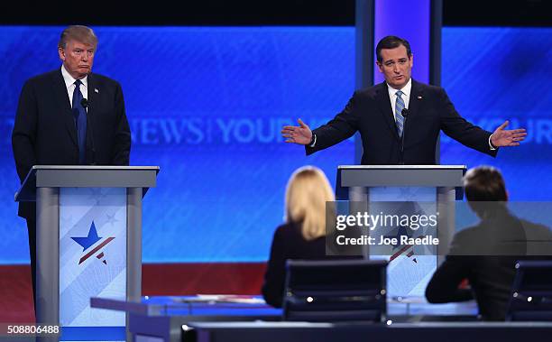 Republican presidential candidates Donald Trump and Sen. Ted Cruz participate in the Republican presidential debate at St. Anselm College February 6,...