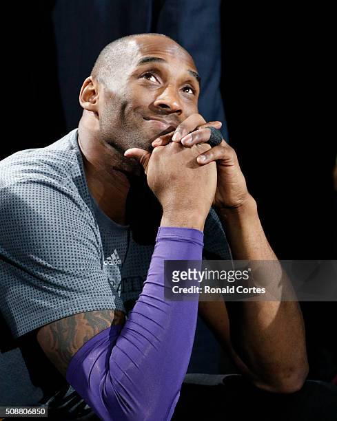 Kobe Bryant of the Los Angeles Lakers watches tribute at AT&T Center on February 6, 2016 in San Antonio, Texas. NOTE TO USER: User expressly...