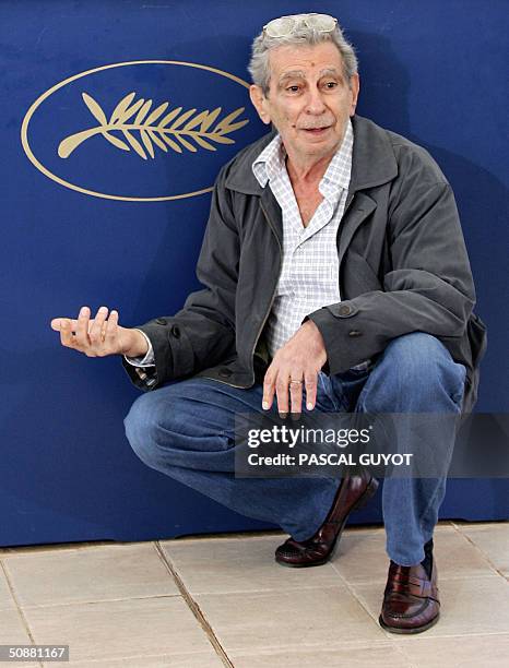 Egyptian director Youssef Chahine poses during a photo call for his film "Alexandria...New York", 21 May 2004, at the 57th Cannes Film Festival in...