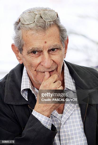 Egyptian director Youssef Chahine poses during a photo call for his film "Alexandria...New York", 21 May 2004, at the 57th Cannes Film Festival in...