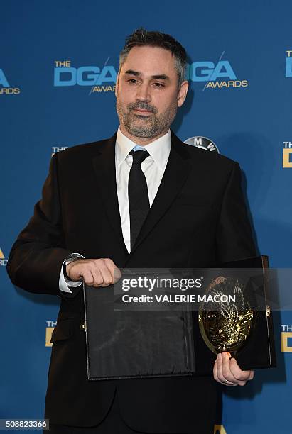 Director Alex Garland, winner of the award for Outstanding Directorial Achievement of a First-Time Feature Film Director for 'Ex Machina,' poses in...