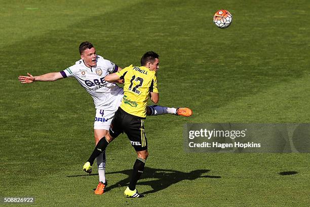 Shane Lowry of the Glory and Blake Powell of the Phoenix compete for a header during the round 18 A-League match between Wellington Phoenix and Perth...