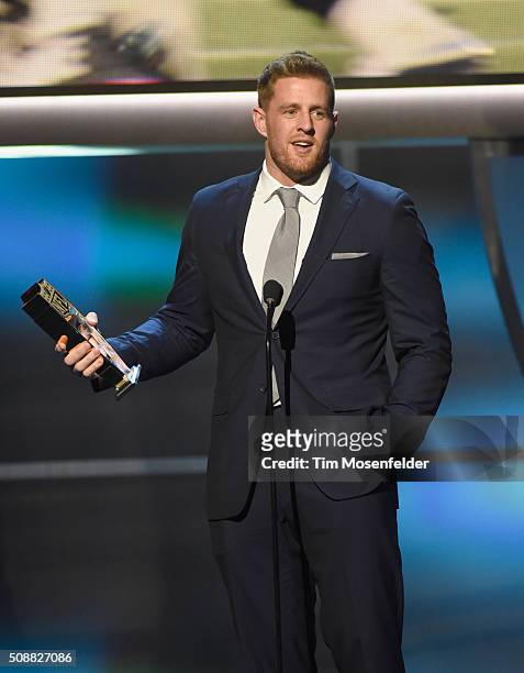 Player J. J. Watt accepts the AP Defensive Player of the Year award onstage during the 5th Annual NFL Honors at Bill Graham Civic Auditorium on...
