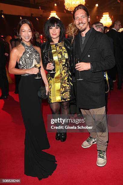 Jean Toh, Anna Fischer and her boyfriend Leonard Andreae during the Goldene Kamera 2016 reception on February 6, 2016 in Hamburg, Germany.