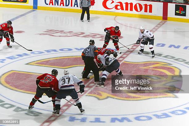 The Calgary Flames faceoff against Vancouver Canucks to start game four of the first round of the 2004 NHL Stanley Cup Playoffs at the Pengrowth...