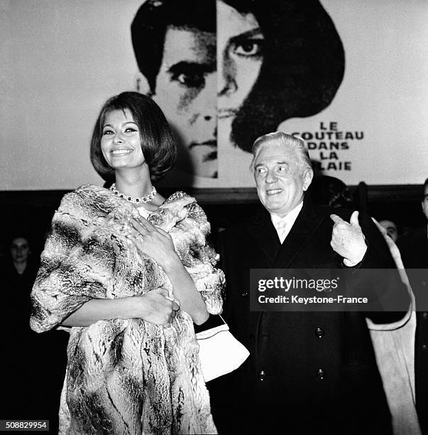 Actress Sophia Loren At the Premiere Of the Movie 'Five Miles From Midnight' - 'Le Couteau Dans La Plaie' - With Director Anatole Litvak, in Paris,...