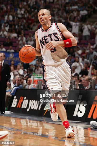 Jason Kidd of the New Jersey Nets moves the ball against the Detroit Pistons in Game six of the Eastern Conference Semifinals during the 2004 NBA...