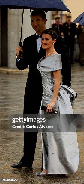 Spanish Crown Prince Felipe de Bourbon and his fiancee, former journalist Letizia Ortiz Rocasolano, arrive to attend a gala dinner at El Pardo Royal...