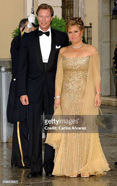 Grand Duke Henri and The Grand Duchess Maria Teresa of Luxembourg arrive to attend a gala dinner at El Pardo Royal Palace on May 21, 2004 in Madrid,...