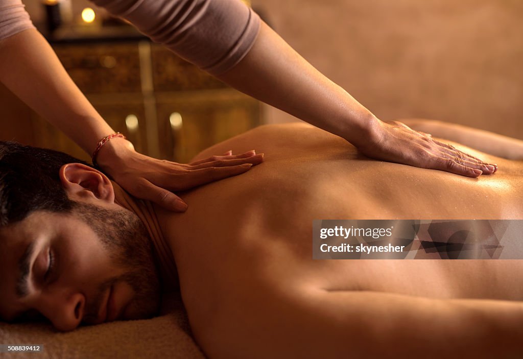 https://media.gettyimages.com/id/508839412/photo/young-man-relaxing-at-spa-during-back-massage.jpg?s=1024x1024&w=gi&k=20&c=l5iHX-XTdg5Lzo4UMCmmRdTPfPdHiWhjF5Qk4_NOfkE=