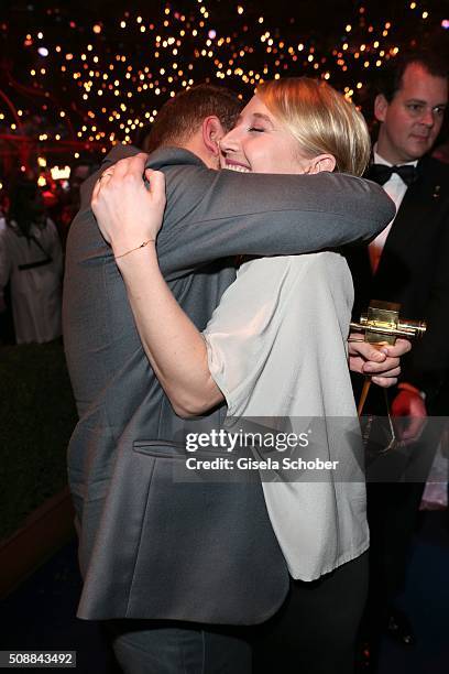 Edin Hasanovic with award and Anna Maria Muehe during the after show party of the Goldene Kamera 2016 on February 6, 2016 in Hamburg, Germany.