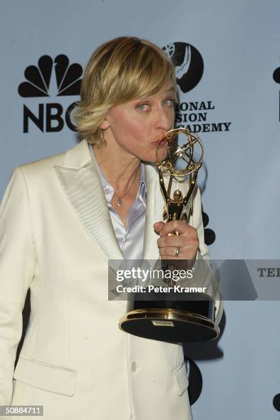 Talk show host Ellen DeGeneres poses with her award for Best Talk Show Host backstage at the 31st Annual Daytime Emmy Awards on May 21, 2004 at Radio...