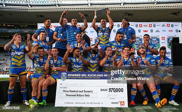 Eels players celebrate after winning the 2016 Auckland Nines Grand Final match between the Warriors and the Eels at Eden Park on February 7, 2016 in...