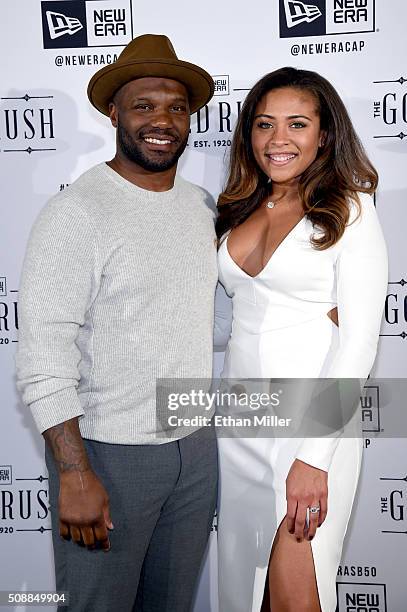 Player D'Qwell Jackson and Christina Weaver attend the New Era Super Bowl party at The Battery on February 6, 2016 in San Francisco, California.