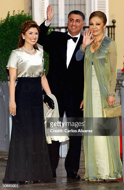 Farah Pahlavi, wife of the late Shah of Iran, poses with her son as they attend a gala dinner at El Pardo Royal Palace May 21, 2004 in Madrid, Spain....