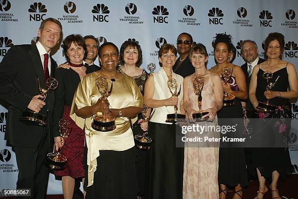 Outstanding Drama Series team pose with their awards backstage at the 31st Annual Daytime Emmy Awards on May 21, 2004 at Radio City Music Hall, in...