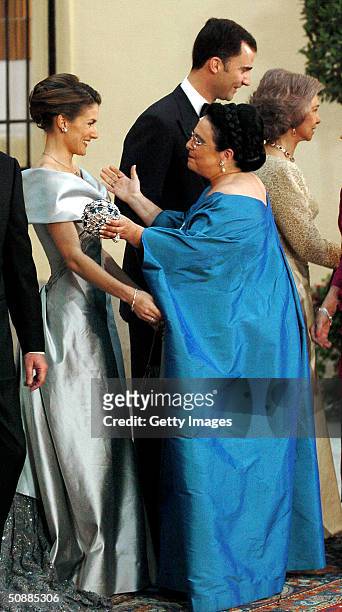 Maria Alejandra Romanov greets Spanish Crown Prince Felipe fiancee Letizia Ortiz Rocasolano as she arrives to attend a gala dinner at El Pardo Royal...