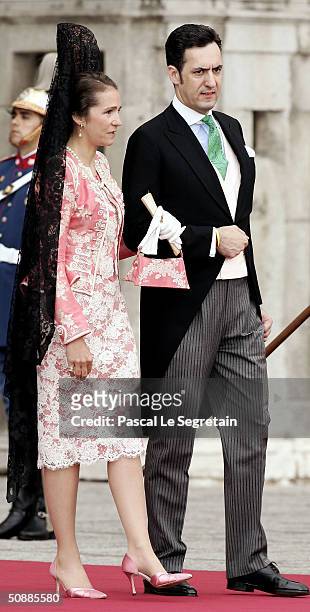 Spanish Infanta Elena and her husband Jaime de Marichalar arrive to attend the wedding between Spanish Crown Prince Felipe de Bourbon and former...