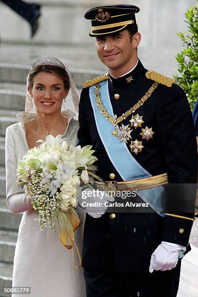 Spanish Crown Prince Felipe de Bourbon and his bride, princess Letizia Ortiz leave the Almudena cathedral after their wedding ceremony May 22, 2004...