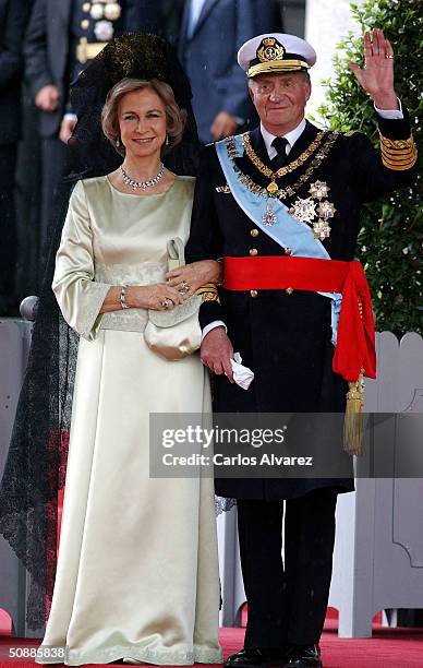 King Juan Carlos and Queen Sofia of Spain leave after they attended the wedding ceremony between Spanish Crown Prince Felipe de Bourbon and former...