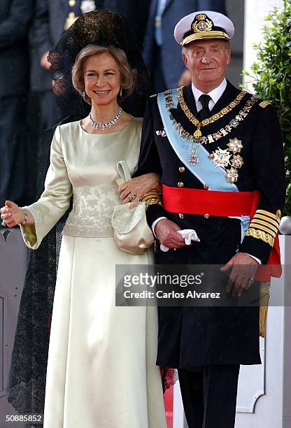 King Juan Carlos and Queen Sofia of Spain leave after they attended the wedding ceremony between Spanish Crown Prince Felipe de Bourbon and former...