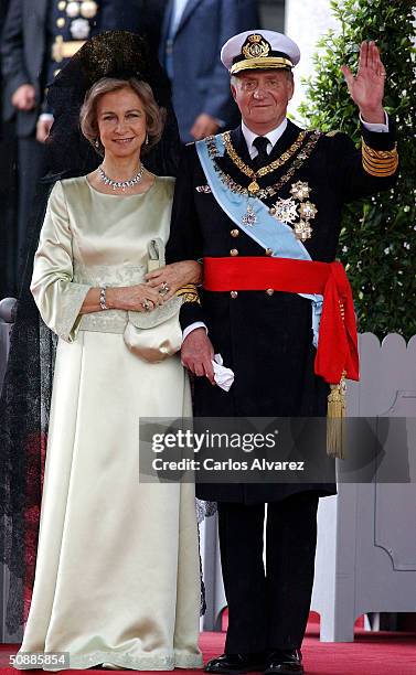 King Juan Carlos and Queen Sofia of Spain leave after they attended the wedding ceremony between Spanish Crown Prince Felipe de Bourbon and former...