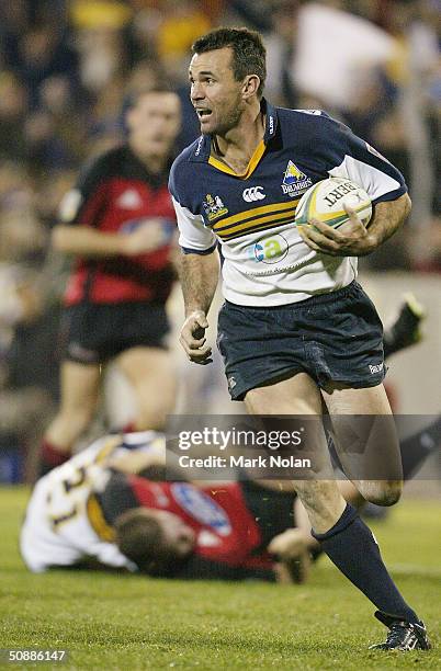Joe Roff of the Brumbies on the way to the try line during the Super 12 Rugby Final between the ACT Brumbies and the Crusaders at Canberra Stadium...