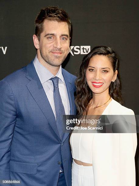 Player Aaron Rodgers and actress Olivia Munn attend the DirecTV and Pepsi Super Saturday Night featuring Red Hot Chili Peppers at Pier 70 on February...