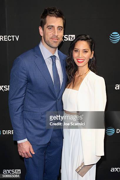 Player Aaron Rodgers and actress Olivia Munn attend the DirecTV and Pepsi Super Saturday Night featuring Red Hot Chili Peppers at Pier 70 on February...