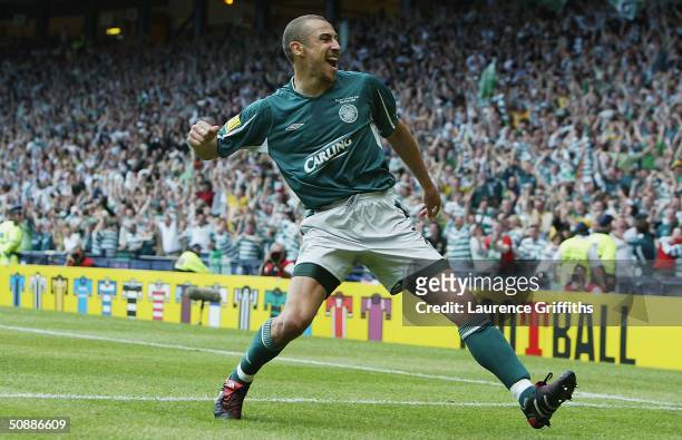 Henrik Larsson of Celtic scores his second goal during the 119th Scottish Tennents Cup Final between Celtic and Dunfermline held at Hampden Park on...