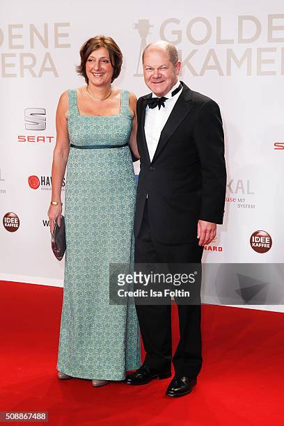 First Mayor of Hmaburg Olaf Scholz and his wife Britta Ernst attend the Goldene Kamera 2016 on February 6, 2016 in Hamburg, Germany.
