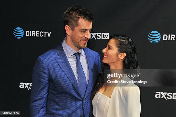 Player Aaron Rodgers and actress Olivia Munn attend the DirecTV and Pepsi Super Saturday Night featuring Red Hot Chili Peppers at Pier 70 on February...