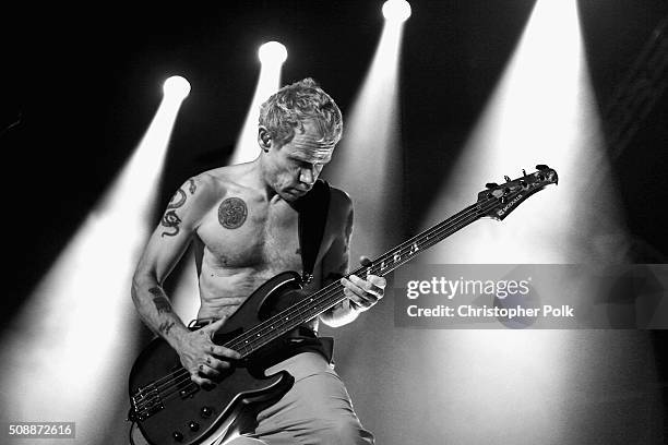 Recording artist Flea of Red Hot Chili Peppers performs onstage during DirecTV Super Saturday Night co-hosted by Mark Cuban's AXS TV at Pier 70 on...