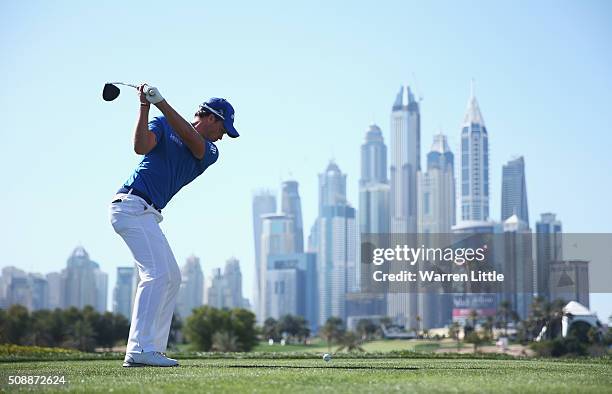 Danny Willett of England tees off on the 8th hole during the final round of the Omega Dubai Desert Classic at the Emirates Golf Club on February 7,...