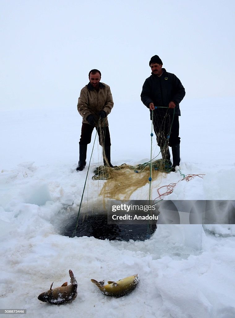 Fishing over frozen lake in Turkey's Bitlis
