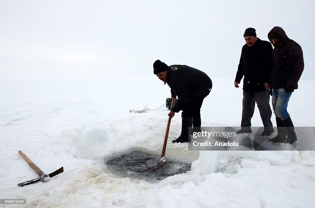 Fishing over frozen lake in Turkey's Bitlis