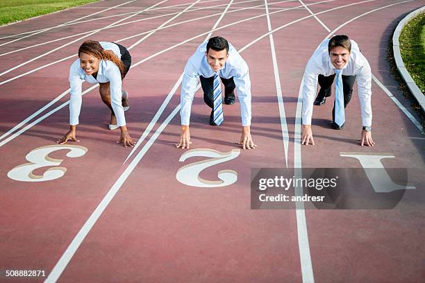 business people racing - one in three people stock pictures, royalty-free photos & images