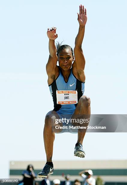 Marion Jones compets in the long jump during the Home Depot Invitational, the first invitational stop on USA Track & Field?s 2004 Outdoor Golden...