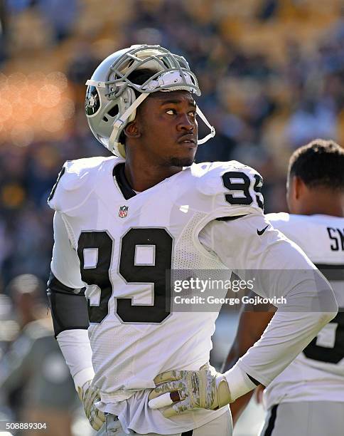 Linebacker Aldon Smith of the Oakland Raiders looks on from the field before a game against the Pittsburgh Steelers at Heinz Field on November 8,...